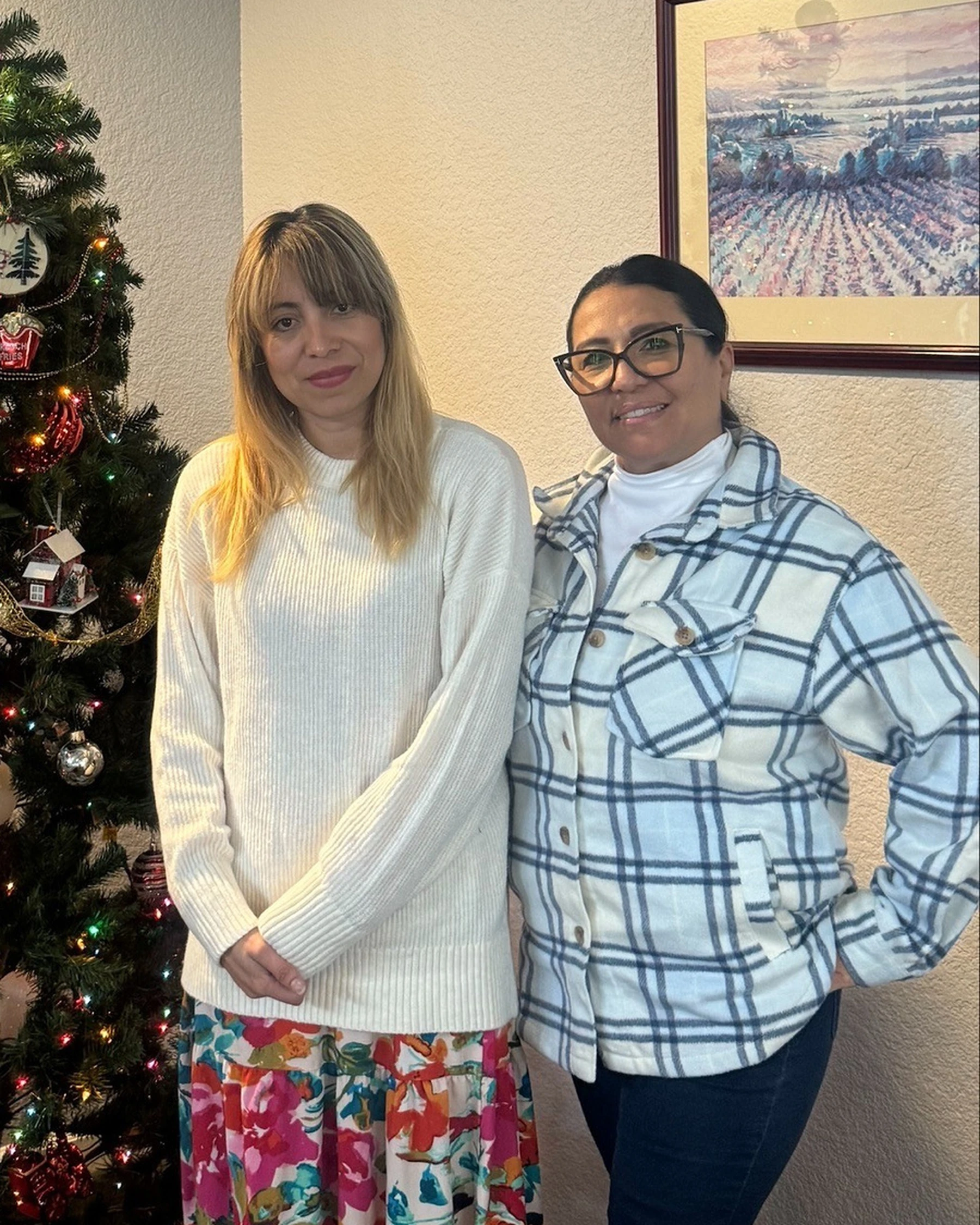 Diana and Resident Services Coordinator Daisy Gomez, featured in the 2025 annual report.